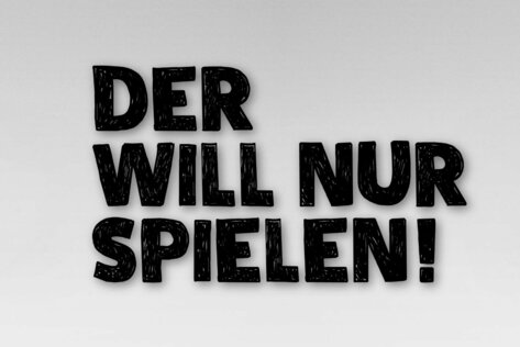 Auf Martin Rütters Kopf steht ein Bein eines Hundes