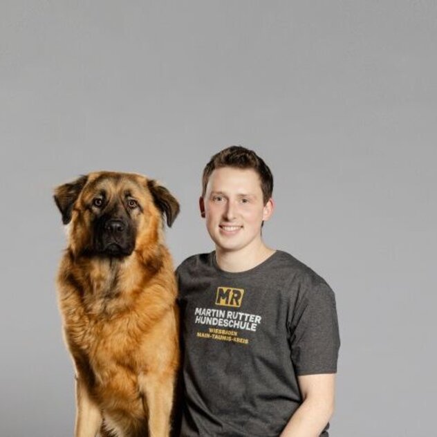 Hundetrainer Marcel Wunderlich mit Hund Calito